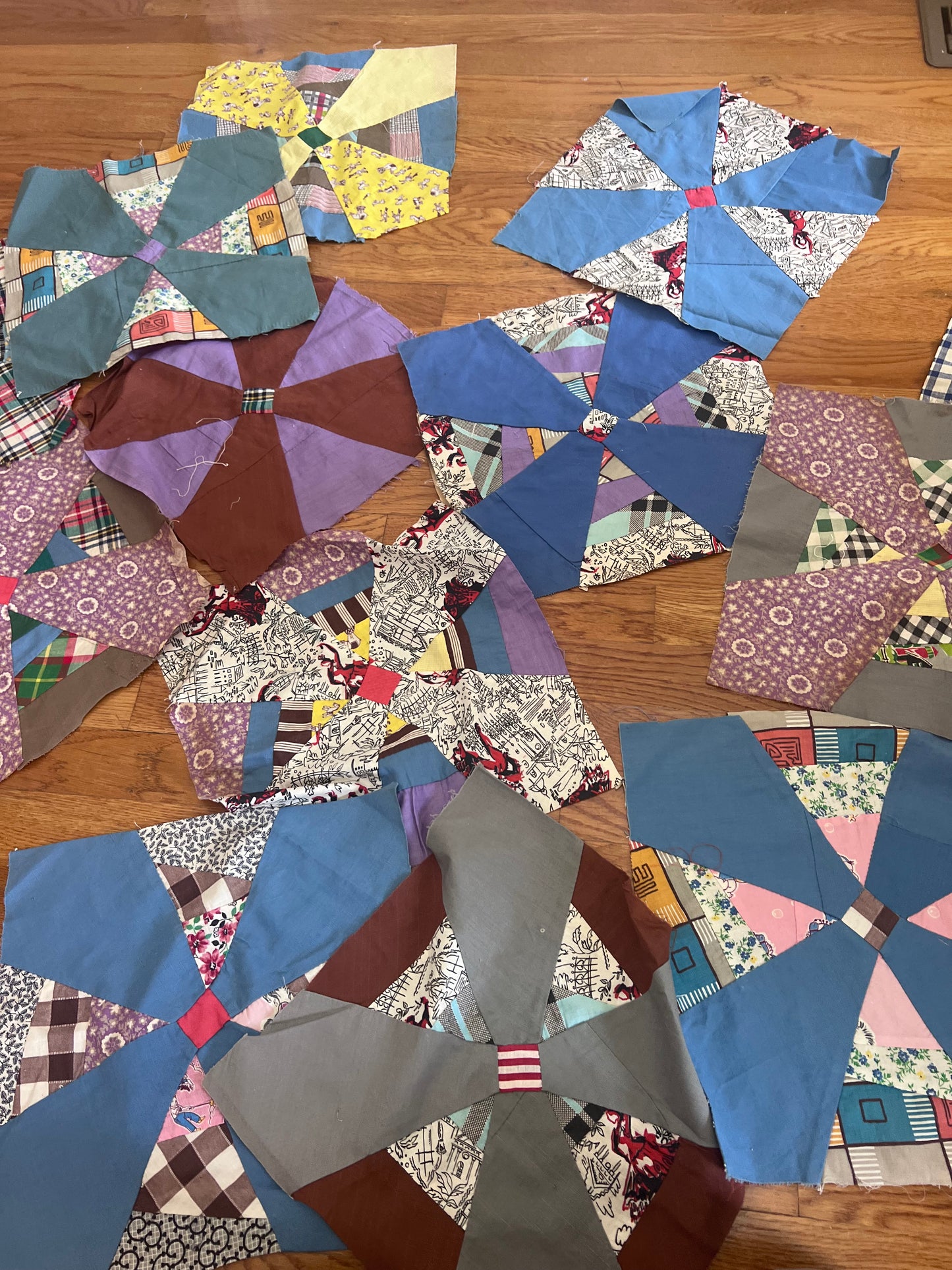 Set of 14 Vintage Hand-Pieced Quilt Blocks | 13” Pinwheel / Windmill Blocks | Newspaper Foundation | Scrappy Fabrics
